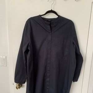 Easy elegant black dress, collarless, long sleeves, button front